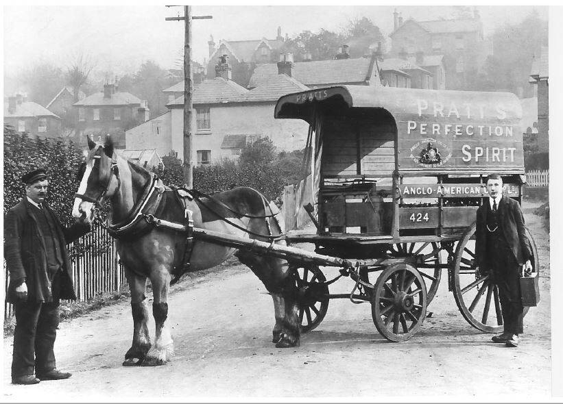 Image Photo In 1910 a horse drawn van used by the Anglo-American Oil Co. for the delivery of 2-gallon cans of petroleum spirit on the Isle of Wight.
