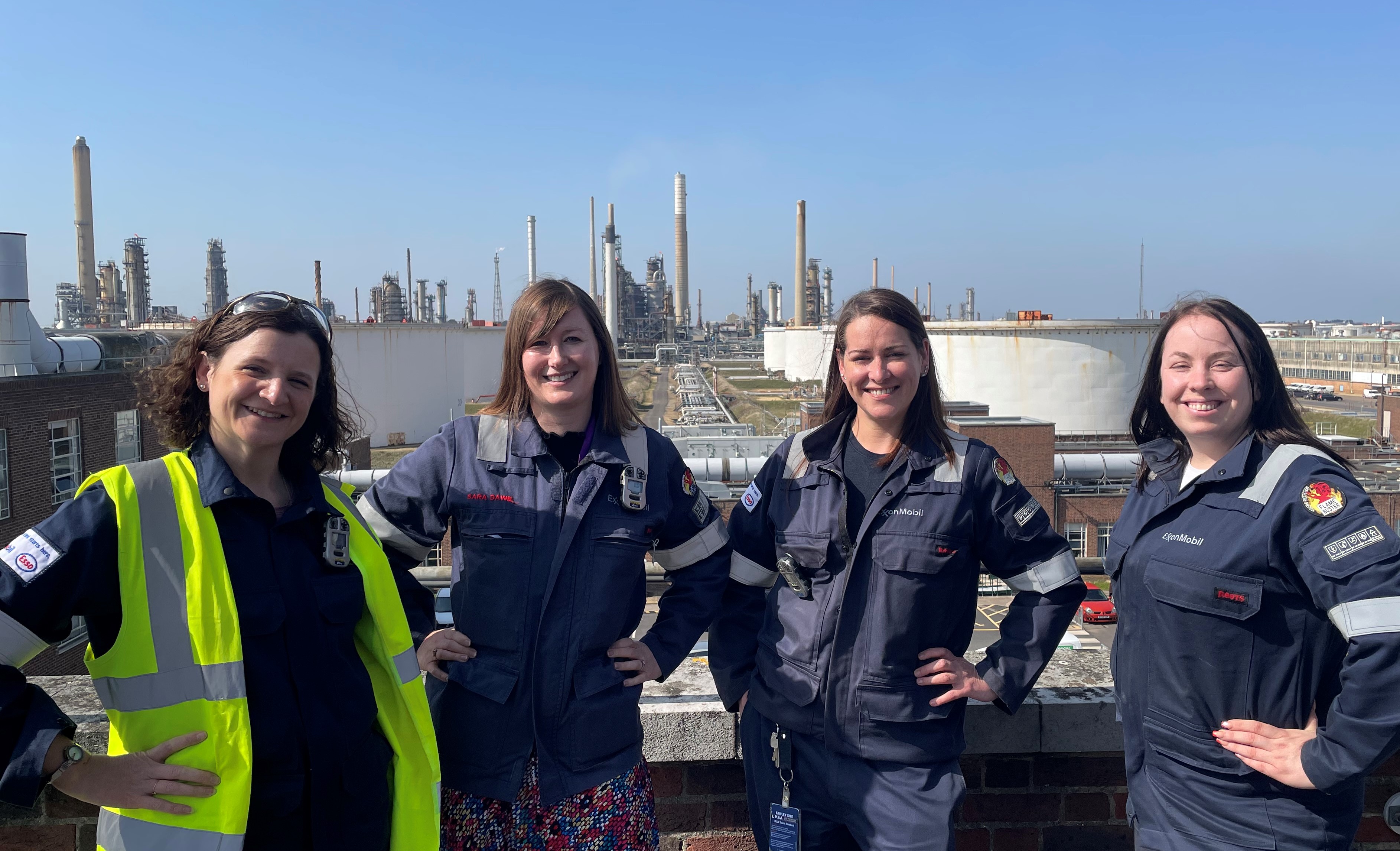 Four female engineers on rooftop