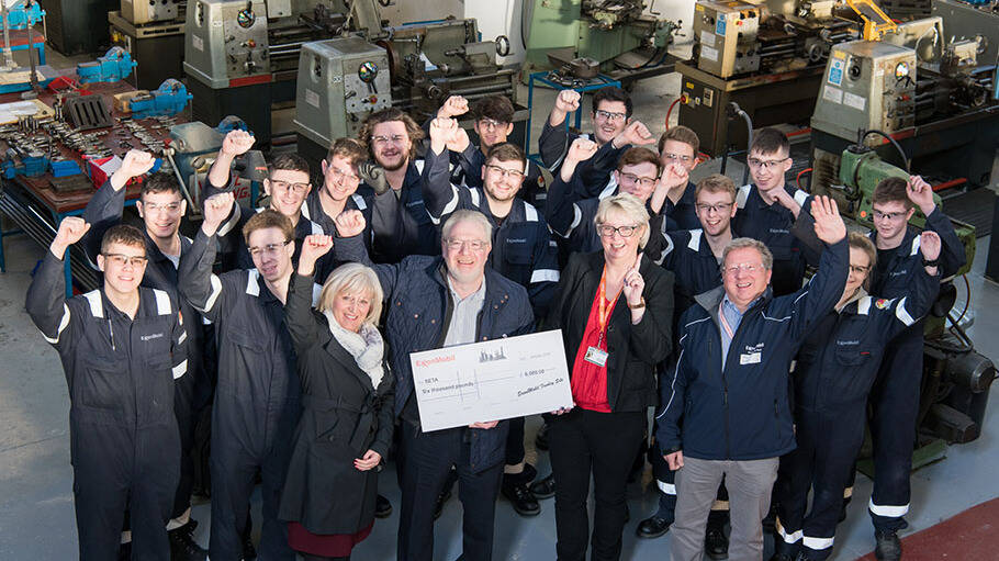 Image Photo  Alison Jones, ExxonMobil Fawley Community Affairs Manager, Simon Downing, Julie Gough, Managing Director of SETA, Gary Ranger, ExxonMobil Fawley Chemicals Unit Maintenance Leader and ExxonMobil representative on the SETA Board of Trustees, with SETA apprentices.