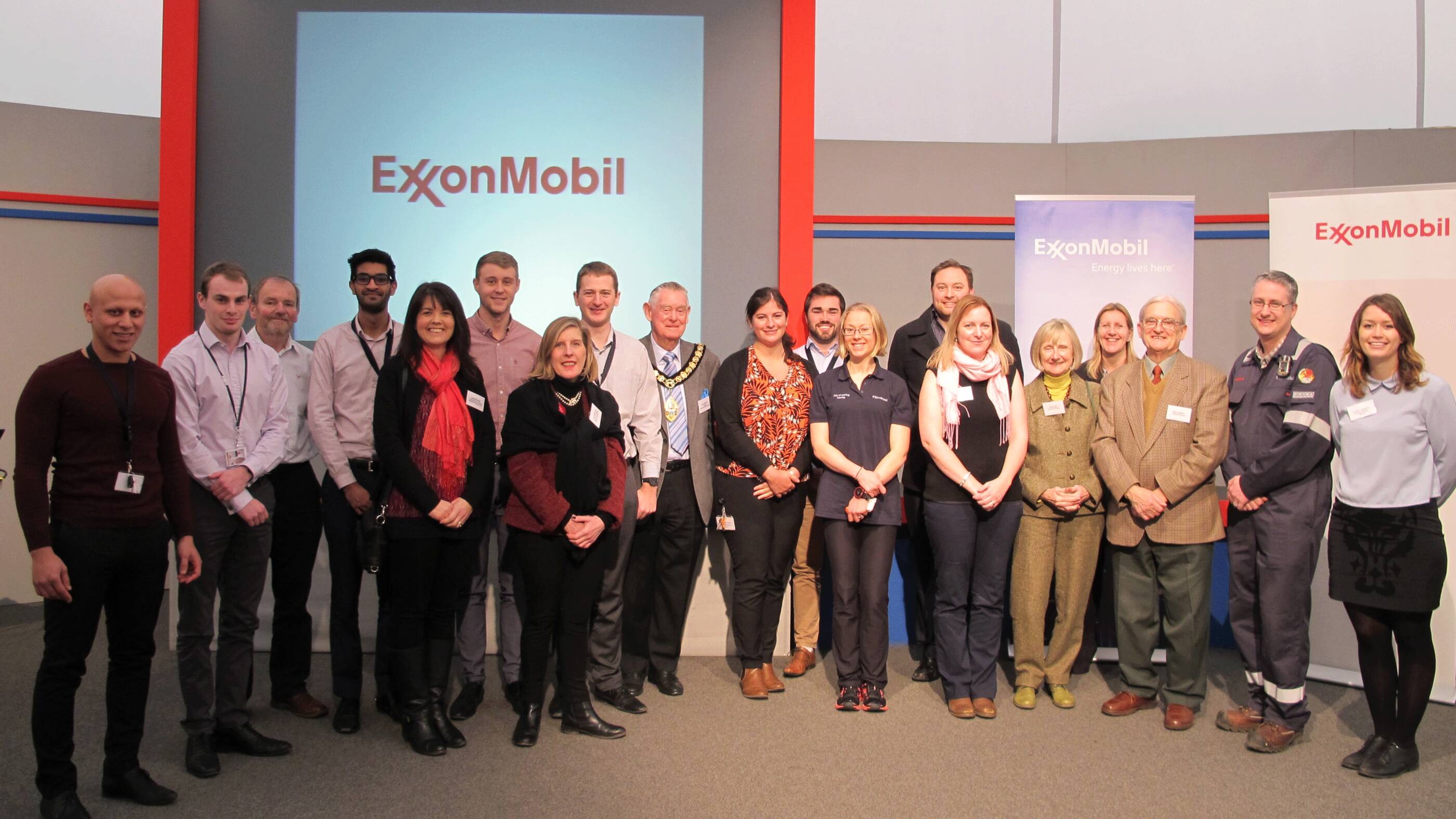Image Photo – Day of Caring volunteers from ExxonMobil at Fawley with representatives from the five projects, Refinery Manager Jon Wetmore and Goff Beck, chairman of New Forest District Council.